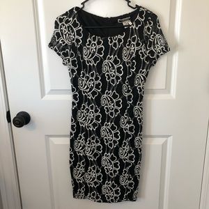 NIKIBIKI - Timeless black & white lace dress.